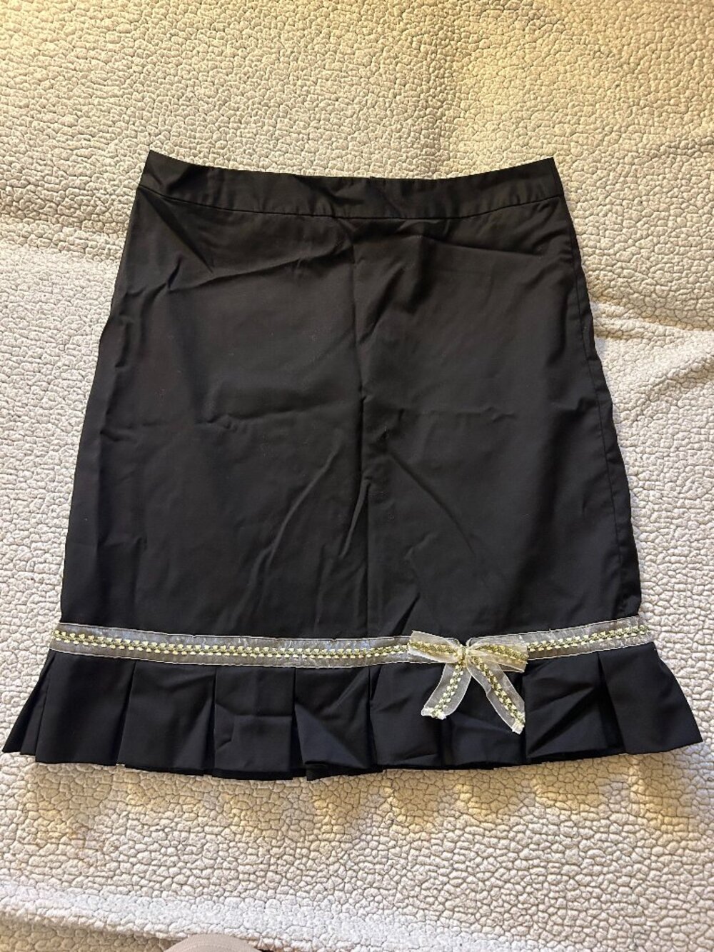 Banana Republic -- black midi skirt with ribbon bow detail, pleated bottom